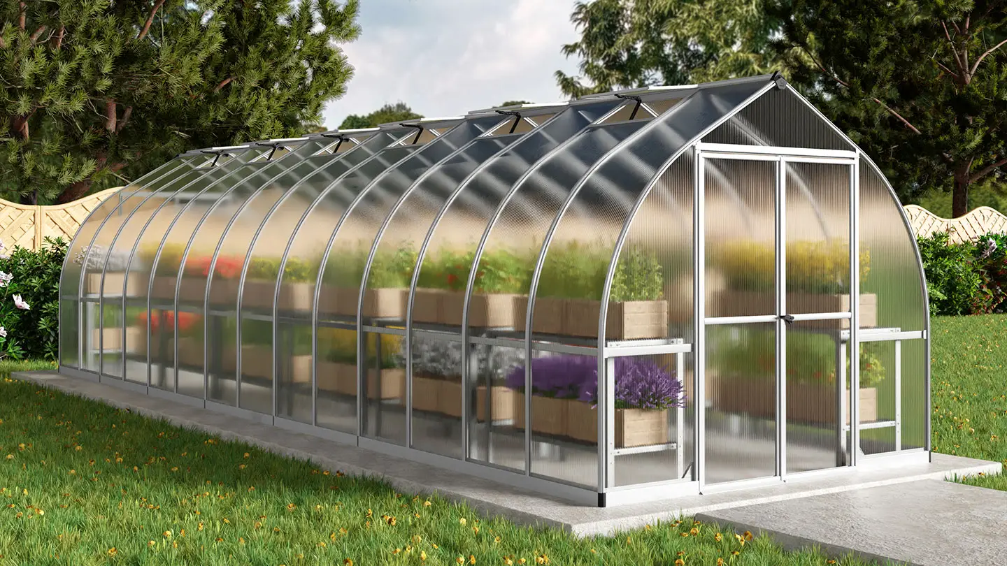 Tunnel shaped greenhouse in a rural garden