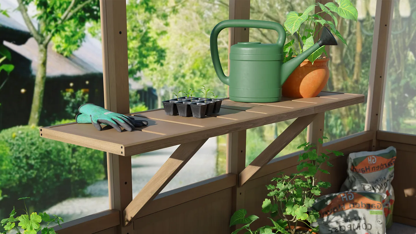 Shelve attached to the inside of a greenhouse with diffrent greenhouse accessories laying on top